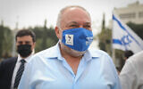 Yisrael Beytenu chief Avigdor Liberman speaks to Israelis around Dizengoff Square in Tel Aviv on March 23, 2021. (Noam Revkin Fenton/Flash90)
