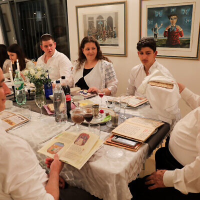 A family seen during the Jewish holiday of Passover, in Tzur Hadassah, April 8, 2020. (Nati Shohat/Flash90)