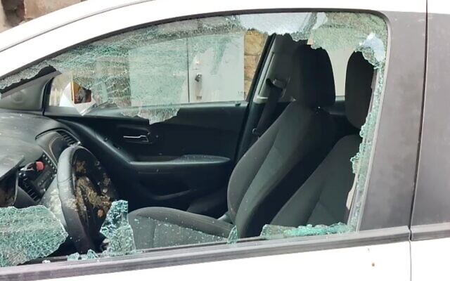 Screen capture from video showing damage to the vehicle of a Turkish new crew who were attacked in the Jerusalem ultra-Orthodox neighborhood of Mea Shearim, March 3, 2021. (Israel Police)