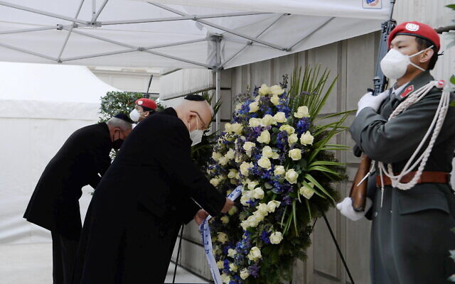 Israeli President Reuven Rivlin (R) and Austrian President Alexander Van der Bellen take part in a ceremony at a monument to Holocaust victims in Vienna, March 17, 2021 (Amos Ben Gershom/GPO) Israeli President Reuven Rivlin (R) and Austrian President Alexander Van der Bellen take part in a ceremony at a monument to Holocaust victims in Vienna, March 17, 2021 (Amos Ben Gershom/GPO)