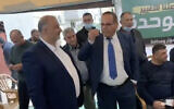 Likud MK Ayoub Kara, right, meets with Ra'am chief Mansour Abbas in the northern town of Maghar on March 27, 2021. (Screen capture: Twitter)