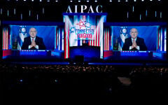Prime Minister Benjamin Netanyahu speaks on a video from Israel to the 2019 American Israel Public Affairs Committee (AIPAC) policy conference, at Washington Convention Center, in Washington, DC, on March 26, 2019. (AP/Jose Luis Magana)