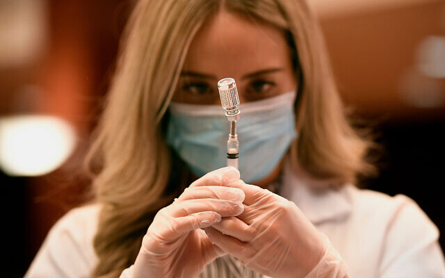 A pharmacist draws a syringe of Johnson & Johnson COVID-19 vaccine at Hartford Hospital in Hartford, Connecticut, March 3, 2021. (AP Photo/Jessica Hill) A pharmacist draws a syringe of Johnson & Johnson COVID-19 vaccine at Hartford Hospital in Hartford, Connecticut, March 3, 2021. (AP Photo/Jessica Hill)