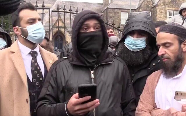 Protesters decry the use of a cartoon of the Prophet Muhammad in the British town of Batley, March 2021. (Twitter screenshot) Protesters decry the use of a cartoon of the Prophet Muhammad in the British town of Batley, March 2021. (Twitter screenshot)