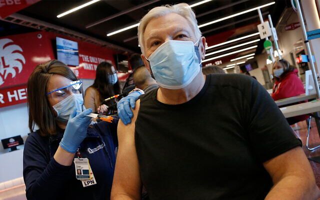 A clinician administers a Johnson & Johnson COVID-19 vaccine shot in Columbus, Ohio, March 2, 2021. (AP Photo/Jay LaPrete) A clinician administers a Johnson & Johnson COVID-19 vaccine shot in Columbus, Ohio, March 2, 2021. (AP Photo/Jay LaPrete)