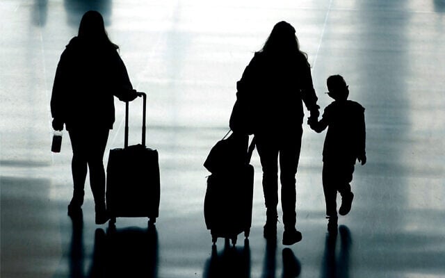 Travelers walk in Salt Lake City International Airport, in Salt Lake City, Utah, March 9, 2021. (AP Photo/Rick Bowmer) Travelers walk in Salt Lake City International Airport, in Salt Lake City, Utah, March 9, 2021. (AP Photo/Rick Bowmer)