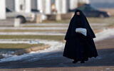 Illustrative: A young woman and member of the Lev Tahor community in the Canadian city of Chatham, Ontario, November 29, 2013. (Rick Madonik/Toronto Star via Getty Images, JTA)
