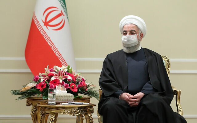 Iranian President Hassan Rouhani meets with Irish Foreign Minister Simon Coveney, in Tehran, Iran, March 7, 2021. (Iranian Presidency Office via AP) Iranian President Hassan Rouhani meets with Irish Foreign Minister Simon Coveney, in Tehran, Iran, March 7, 2021. (Iranian Presidency Office via AP)