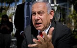 Prime Minister Benjamin Netanyahu and Jerusalem Mayor Moshe Leon visit a restaurant in Jerusalem, March 7, 2021. (Noam Revkin Fenton/Flash90)