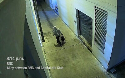 A man suspected of planting pipe bombs at political party headquarters in Washington, DC, on January 5, 2020, in surveillance footage released by the FBI. (Screenshot/YouTube)