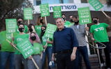 Head of the left-wing Meretz party with supporters outside of the Education Ministry in Tel Aviv, February 9, 2021. (Miriam Alster/FLASH90)