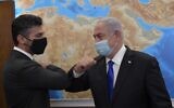 File: Prime Minister Benjamin Netanyahu (R) meets with the UAE's new ambassador to Israel Mohammad Mahmoud Al Khajah at his Jerusalem office on March 2, 2021. (Kobi Gideon/GPO)