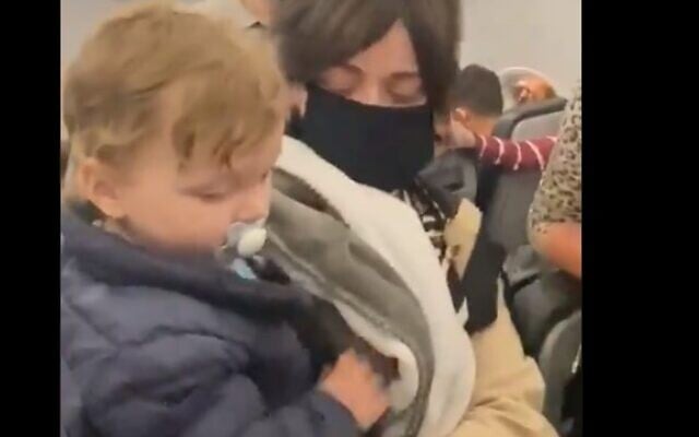 Frontier Airlines is facing accusations of anti-Semitism after videos circulated online on February 28, 2021 of the airline kicking a Hasidic family off the flight because a toddler was not wearing a mask (Screenshot/Twitter) Frontier Airlines is facing accusations of anti-Semitism after videos circulated online on February 28, 2021 of the airline kicking a Hasidic family off the flight because a toddler was not wearing a mask (Screenshot/Twitter)