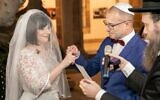 Yevgenia Bogatov (left) and Lazar Roif during their wedding ceremony at Rambam Medical Center (courtesy of Rambam Medical Center)
