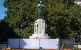 A fence in Vienna surrounds the statue of Karl Lueger, the anti-Semitic former mayor of the Austrian capital, October 6, 2020. (Joe Klamar/AFP via Getty Images/JTA)
