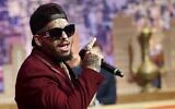 This file picture shows Tunisian-French rapper Swagg Man singing during the shooting of a television show in the capital Tunis on May 11, 2019. (MOHAMED FLISS / AFP)