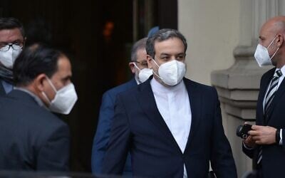Abbas Araghchi, political deputy at the Ministry of Foreign Affairs of Iran, is leaving the 'Grand Hotel Wien' after the closed-door nuclear talks in Vienna on April 16, 2021, where diplomats of the EU, China, Russia and Iran hold their talks. (JOE KLAMAR / AFP)