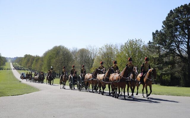 Members of the King's Troop Royal Horse Artillery ride up the Long Walk to Windsor Castle in Windsor, west of London, on April 17, 2021 for the funeral of Britain's Prince Philip, Duke of Edinburgh. (Photo by PHIL NOBLE / various sources / AFP)