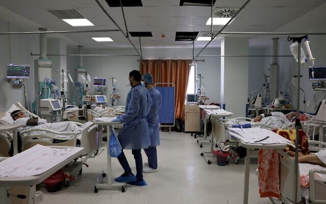 This picture taken on April 22, 2021 shows a general view of nurses and patients at the COVID-19 coronavirus intensive care unit at the Turkish-Palestinian Friendship Hospital in Gaza City. (Emmanuel DUNAND / AFP) This picture taken on April 22, 2021 shows a general view of nurses and patients at the COVID-19 coronavirus intensive care unit at the Turkish-Palestinian Friendship Hospital in Gaza City. (Emmanuel DUNAND / AFP)
