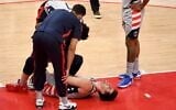 Deni Avdija #9 of the Washington Wizards reacts after an apparent injury during the first half against the Golden State Warriors at Capital One Arena on April 21, 2021 in Washington, DC (Will Newton / GETTY IMAGES NORTH AMERICA / Getty Images via AFP)