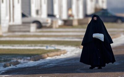 A young woman and member of the Lev Tahor community in the Canadian city of Chatham, Ontario, Nov. 29, 2013. (Rick Madonik/Toronto Star via Getty Images, JTA)