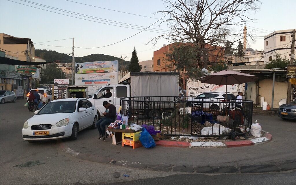 A small traffic circle is situated on the boundary between Israeli Bartaa and Palestinian Bartaa. (Uriel Heilman/ JTA)