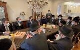 Illustrative: New York City mayoral candidate Andrew Yang, top, third from left, meets with haredi Orthodox Jewish leaders in Borough Park, Brooklyn, in an undated photo supplied by his campaign. (Yang for New York via JTA)