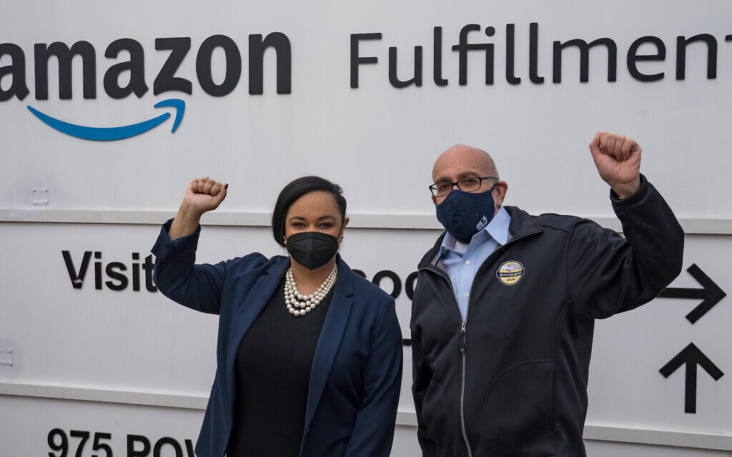 Rep. Nikema Williams of Georgia and RWDSU President Stuart Appelbaum visit the Amazon Fulfillment Center in Birmingham, Alabama, after meeting with workers and organizers involved in the facility's unionization effort, March 5, 2021. (Megan Varner/Getty Images/JTA) Rep. Nikema Williams of Georgia and RWDSU President Stuart Appelbaum visit the Amazon Fulfillment Center in Birmingham, Alabama, after meeting with workers and organizers involved in the facility's unionization effort, March 5, 2021. (Megan Varner/Getty Images/JTA)