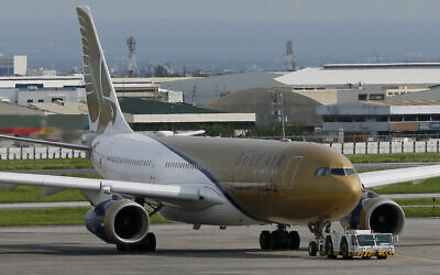 A Gulf Air passenger plane , Aug. 5, 2016, at the Ninoy Aquino International Airport at suburban Pasay city south of Manila, Philippines (AP Photo/Bullit Marquez)