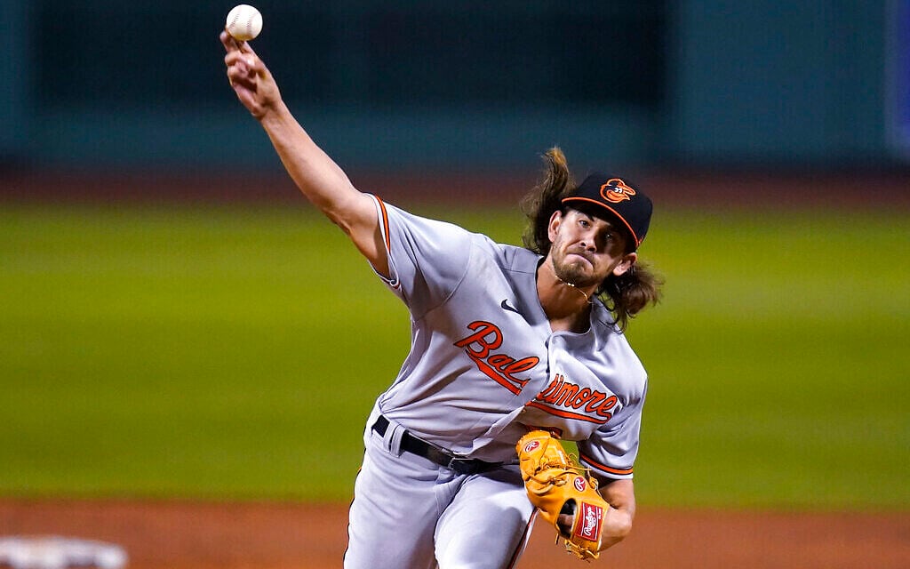 Baltimore Orioles starting pitcher Dean Kremer delivers during the first inning of the team's baseball game against the Boston Red Sox in Boston, September 23, 2020, at Fenway Park. (AP Photo/Charles Krupa)