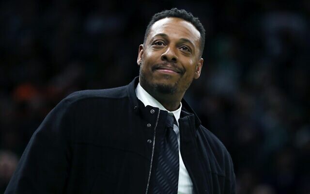 Former Boston Celtic Paul Pierce attends the NBA basketball game between the Celtics and the Houston Rockets in Boston, February 29, 2020. (AP Photo/Michael Dwyer, file) Former Boston Celtic Paul Pierce attends the NBA basketball game between the Celtics and the Houston Rockets in Boston, February 29, 2020. (AP Photo/Michael Dwyer, file)