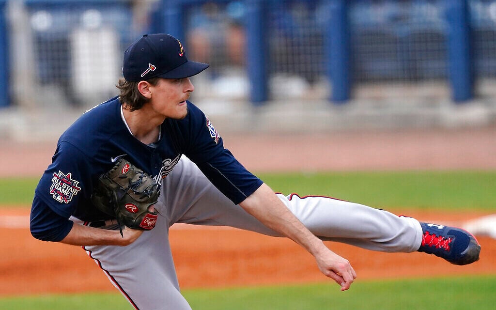 Atlanta Braves starting pitcher Max Fried (54) works against the Tampa Bay Rays in a spring training baseball game, March 21, 2021, in Port Charlotte, Florida. (AP Photo/John Bazemore)