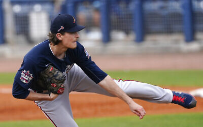 Atlanta Braves starting pitcher Max Fried (54) works against the Tampa Bay Rays in a spring training baseball game, March 21, 2021, in Port Charlotte, Florida. (AP Photo/John Bazemore)