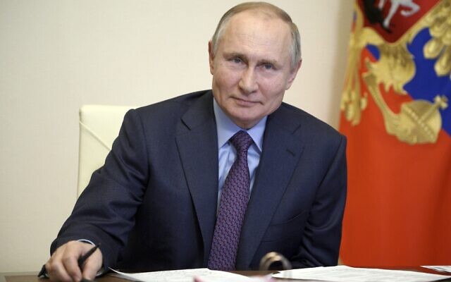 Russian President Vladimir Putin listens during a meeting with government officials via video conference at the Novo-Ogaryovo residence outside Moscow, Russia, March 22, 2021. (Alexei Druzhinin, Sputnik, Kremlin Pool Photo via AP) Russian President Vladimir Putin listens during a meeting with government officials via video conference at the Novo-Ogaryovo residence outside Moscow, Russia, March 22, 2021. (Alexei Druzhinin, Sputnik, Kremlin Pool Photo via AP)