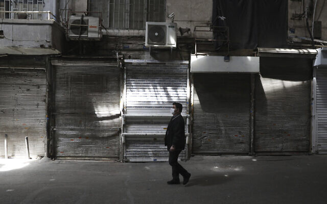 A man walks through Tehran's closed Grand Bazaar, in Tehran, Iran, April 10, 2021. (AP /Vahid Salemi) A man walks through Tehran's closed Grand Bazaar, in Tehran, Iran, April 10, 2021. (AP /Vahid Salemi)