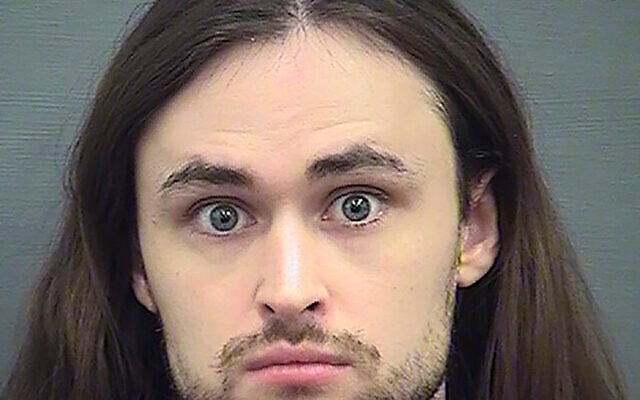This undated file photo provided by the Alexandria Sheriff's Office shows John Cameron Denton, founder and former leader of a neo-Nazi group called Atomwaffen Division. Federal prosecutors in Virginia are seeking a five-year prison sentence for Denton, who pleaded guilty to conspiring with other far-right extremists to threaten dozens of targets, including a predominantly African American church, a sitting U.S. Cabinet member and journalists. U.S. District Judge Liam O’Grady is scheduled to sentence Denton on Tuesday, April 13, 2021. (Alexandria Sheriff's Office via AP, File) This undated file photo provided by the Alexandria Sheriff's Office shows John Cameron Denton, founder and former leader of a neo-Nazi group called Atomwaffen Division. Federal prosecutors in Virginia are seeking a five-year prison sentence for Denton, who pleaded guilty to conspiring with other far-right extremists to threaten dozens of targets, including a predominantly African American church, a sitting U.S. Cabinet member and journalists. U.S. District Judge Liam O’Grady is scheduled to sentence Denton on Tuesday, April 13, 2021. (Alexandria Sheriff's Office via AP, File)