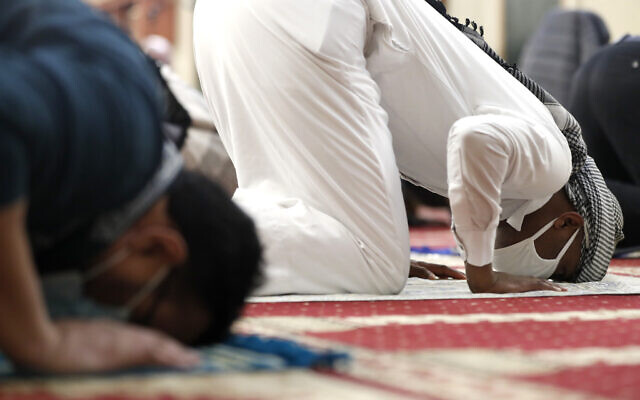 A Muslim bows in Sijdah during an evening prayer called "taraweeh" marking the first eve of the holy fasting month of Ramadan at Chicago's Muslim Community Center on April 12, 2021. (AP Photo/Shafkat Anowar) A Muslim bows in Sijdah during an evening prayer called "taraweeh" marking the first eve of the holy fasting month of Ramadan at Chicago's Muslim Community Center on April 12, 2021. (AP Photo/Shafkat Anowar)