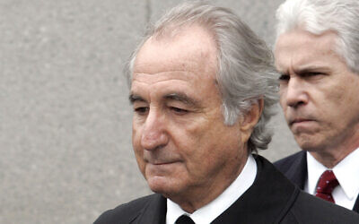 In this March 10, 2009, file photo, former financier Bernie Madoff leaves federal court in Manhattan, in New York. (AP Photo/David Karp, File)