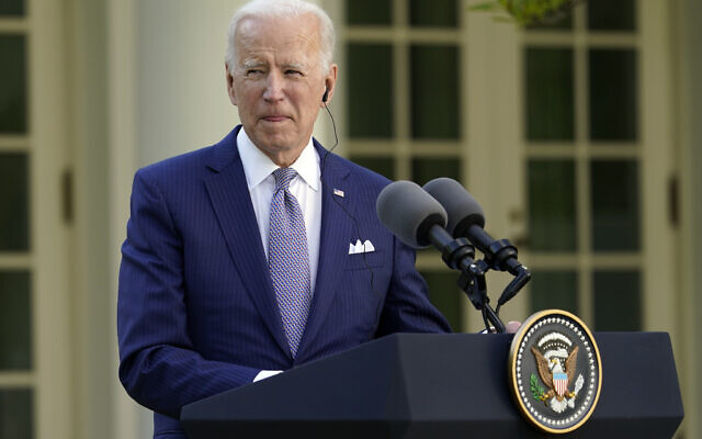 US President Joe Biden listens as Japanese Prime Minister Yoshihide Suga speaks at a news conference in the Rose Garden of the White House, Friday, April 16, 2021, in Washington. (AP Photo/Andrew Harnik) US President Joe Biden listens as Japanese Prime Minister Yoshihide Suga speaks at a news conference in the Rose Garden of the White House, Friday, April 16, 2021, in Washington. (AP Photo/Andrew Harnik)