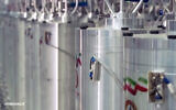 In this image made from April 17, 2021, video released by the Islamic Republic Iran Broadcasting, IRIB, state-run TV, various centrifuge machines line the hall damaged on April 11, 2021, at the Natanz Uranium Enrichment Facility, some 200 miles (322 km) south of the capital Tehran. (IRIB via AP)