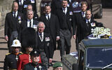 From front left, Britain's Prince Charles, Prince Andrew. Prince Edward, Prince William, Peter Phillips, Prince Harry, Earl of Snowdon and Tim Laurence follow the coffin the coffin makes it's way past the Round Tower during the funeral of Britain's Prince Philip inside Windsor Castle in Windsor, England Saturday April 17, 2021. (Leon Neal/Pool via AP)