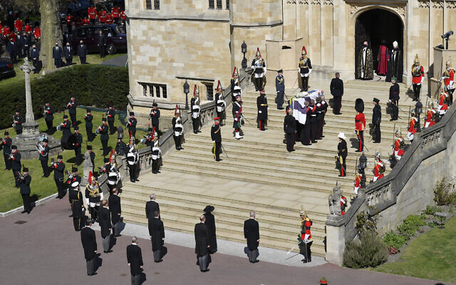 The coffin arrives at St George's Chapel for the funeral of Britain's Prince Philip inside Windsor Castle in Windsor, England, Saturday, April 17, 2021. (Justin Tallis/Pool via AP)