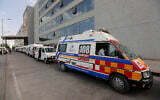 Ambulances carrying COVID-19 patients queue up waiting for their turn to be attended at a dedicated COVID-19 government hospital in Ahmedabad, India, April 17, 2021. (Ajit Solanki/AP)