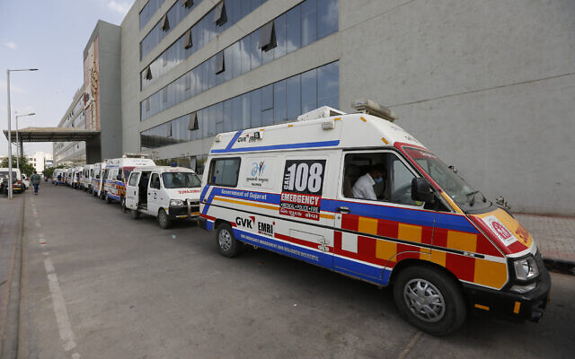 Ambulances carrying COVID-19 patients queue up waiting for their turn to be attended at a dedicated COVID-19 government hospital in Ahmedabad, India, April 17, 2021. (Ajit Solanki/AP) Ambulances carrying COVID-19 patients queue up waiting for their turn to be attended at a dedicated COVID-19 government hospital in Ahmedabad, India, April 17, 2021. (Ajit Solanki/AP)