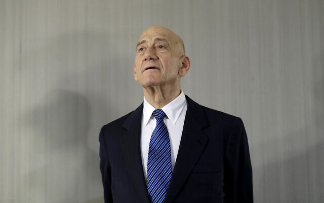 In this Feb. 11, 2020, photo, former prime minister Ehud Olmert takes questions from reporters after a news conference in New York. (AP Photo/Seth Wenig) In this Feb. 11, 2020, photo, former prime minister Ehud Olmert takes questions from reporters after a news conference in New York. (AP Photo/Seth Wenig)