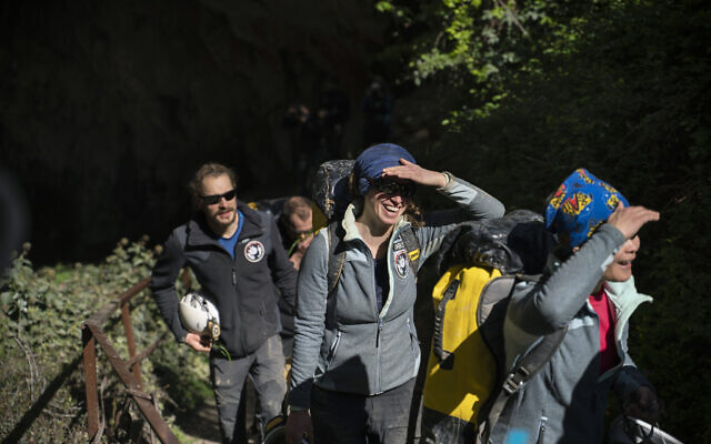 Members of the French team that participated in the 'Deep Time' study, emerge from the Lombrives Cave after 40 days underground in Ussat les Bains, France, April 24, 2021. (Renata Brito/AP) Members of the French team that participated in the 'Deep Time' study, emerge from the Lombrives Cave after 40 days underground in Ussat les Bains, France, April 24, 2021. (Renata Brito/AP)