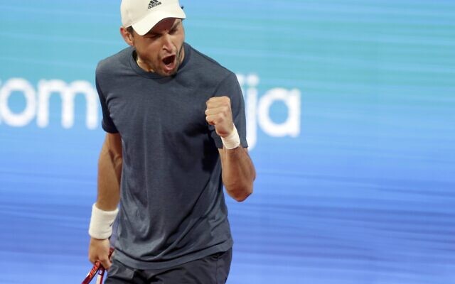 Aslan Karatsev of Russia celebrates a point, during the Serbia Open tennis tournament match against Novak Djokovic of Serbia, in Belgrade, Serbia, Saturday, April 24, 2021. (AP Photo/Darko Vojinovic) Aslan Karatsev of Russia celebrates a point, during the Serbia Open tennis tournament match against Novak Djokovic of Serbia, in Belgrade, Serbia, Saturday, April 24, 2021. (AP Photo/Darko Vojinovic)