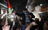 Protesters chant anti-Israel slogans during a protest in solidarity with fellow Palestinian worshippers in Jerusalem, at the main street of Shati refugee camp in Gaza City, April 24, 2021. (AP Photo/Adel Hana)