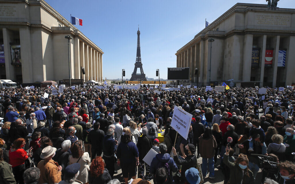 People stage a protest organized by Jewish associations, who say justice has not been done for the killing of French Jewish woman Sarah Halimi, at Trocadero Plaza near Eiffel Tower in Paris, April 25, 2021. (AP Photo/Michel Euler) People stage a protest organized by Jewish associations, who say justice has not been done for the killing of French Jewish woman Sarah Halimi, at Trocadero Plaza near Eiffel Tower in Paris, April 25, 2021. (AP Photo/Michel Euler)