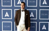 Sacha Baron Cohen poses for a photo during a screening of the Oscars on April 26, 2021 in Sydney, Australia. (AP Photo/Rick Rycroft, Pool)